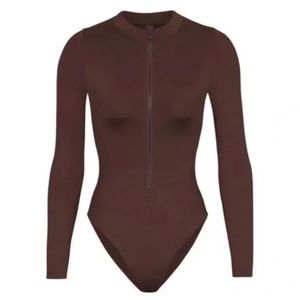 NWT skims zip up swim body suit